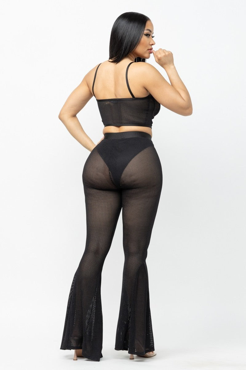 Set mesh negro crop top tirillas pantalón palazo